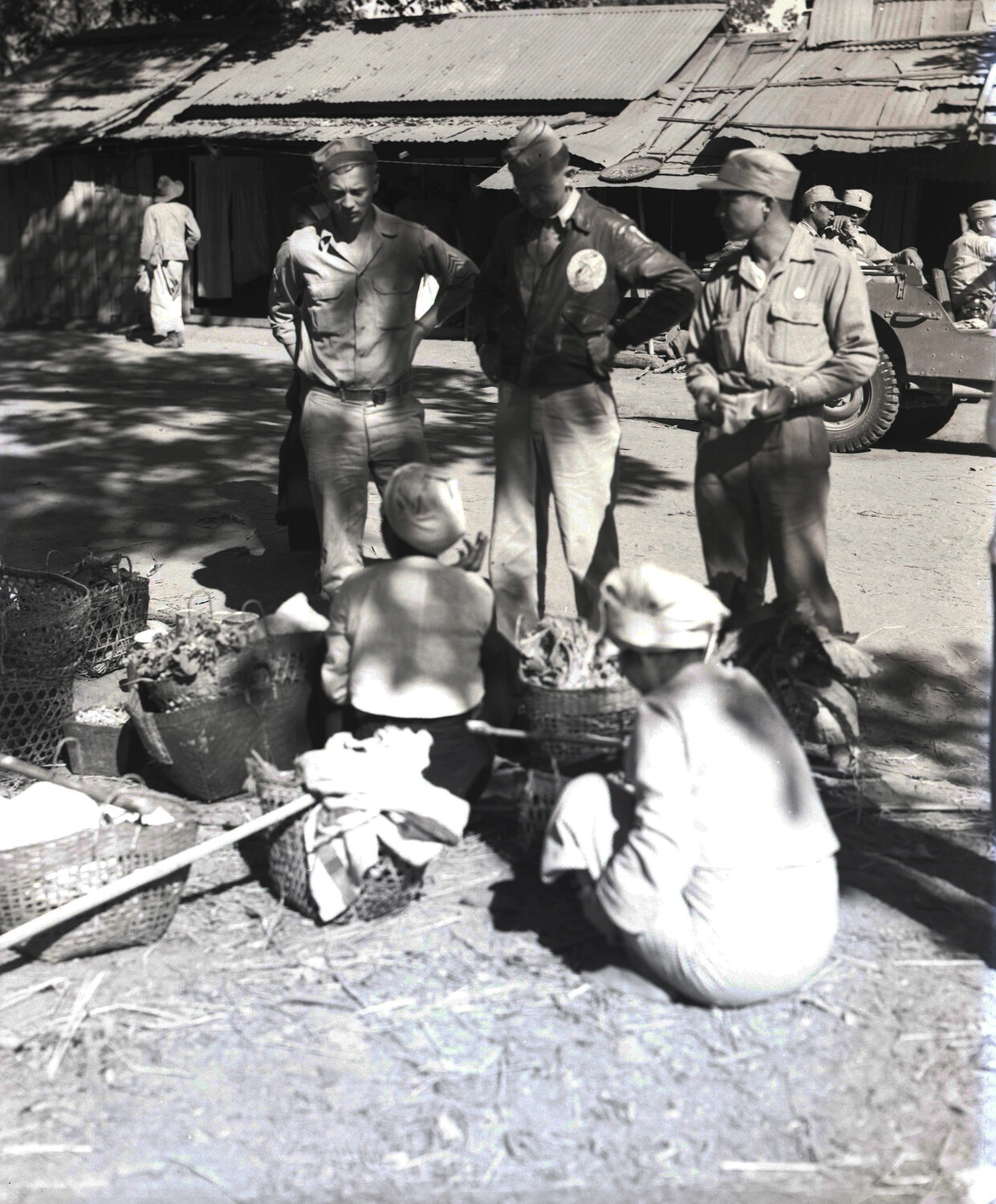 American Servicemen at a Local Market, China-Burma-India Theater, WWII