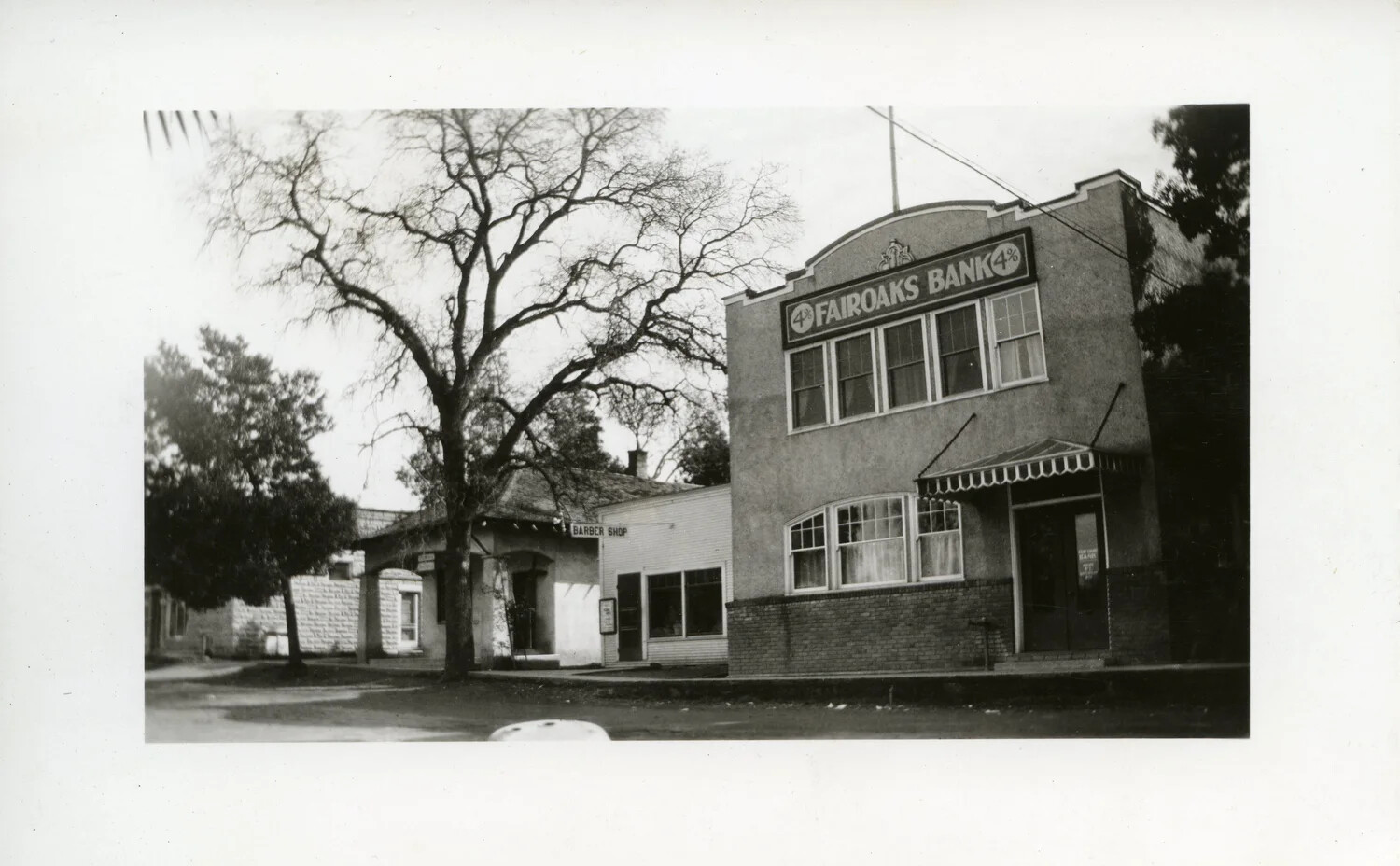 Street View of Fair Oaks Bank and Barber Shop, Small-Town America, Early-to-Mid 20th Century