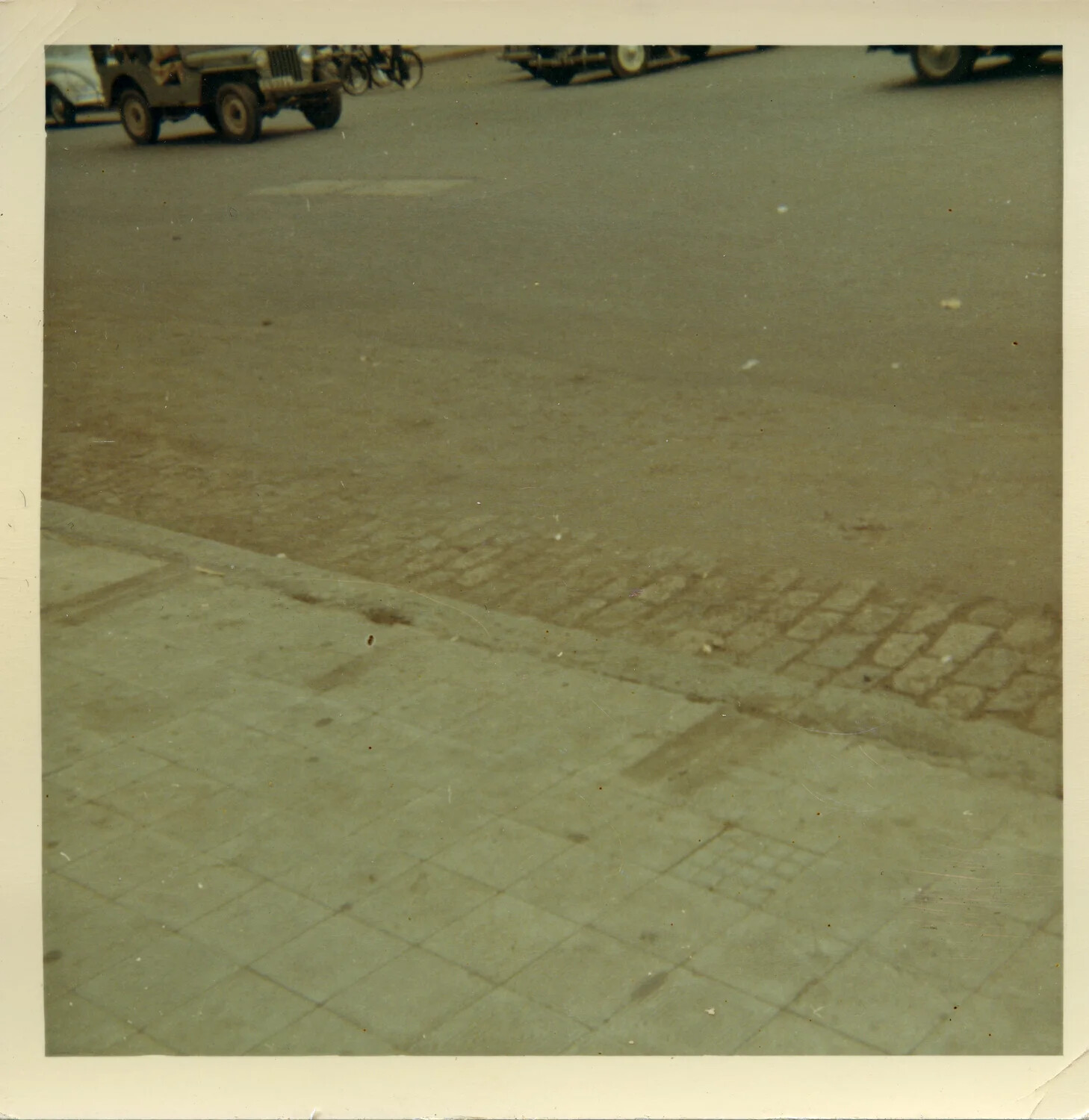Street-Level View with Military Jeep and Bicycles, Saigon, South Vietnam, 1964