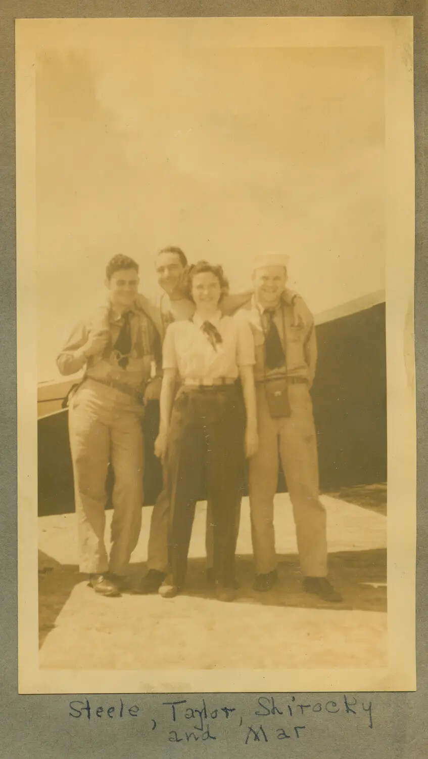 Group Portrait of Steele, Taylor, Shirocky, and Mar(garet) Beside an Aircraft