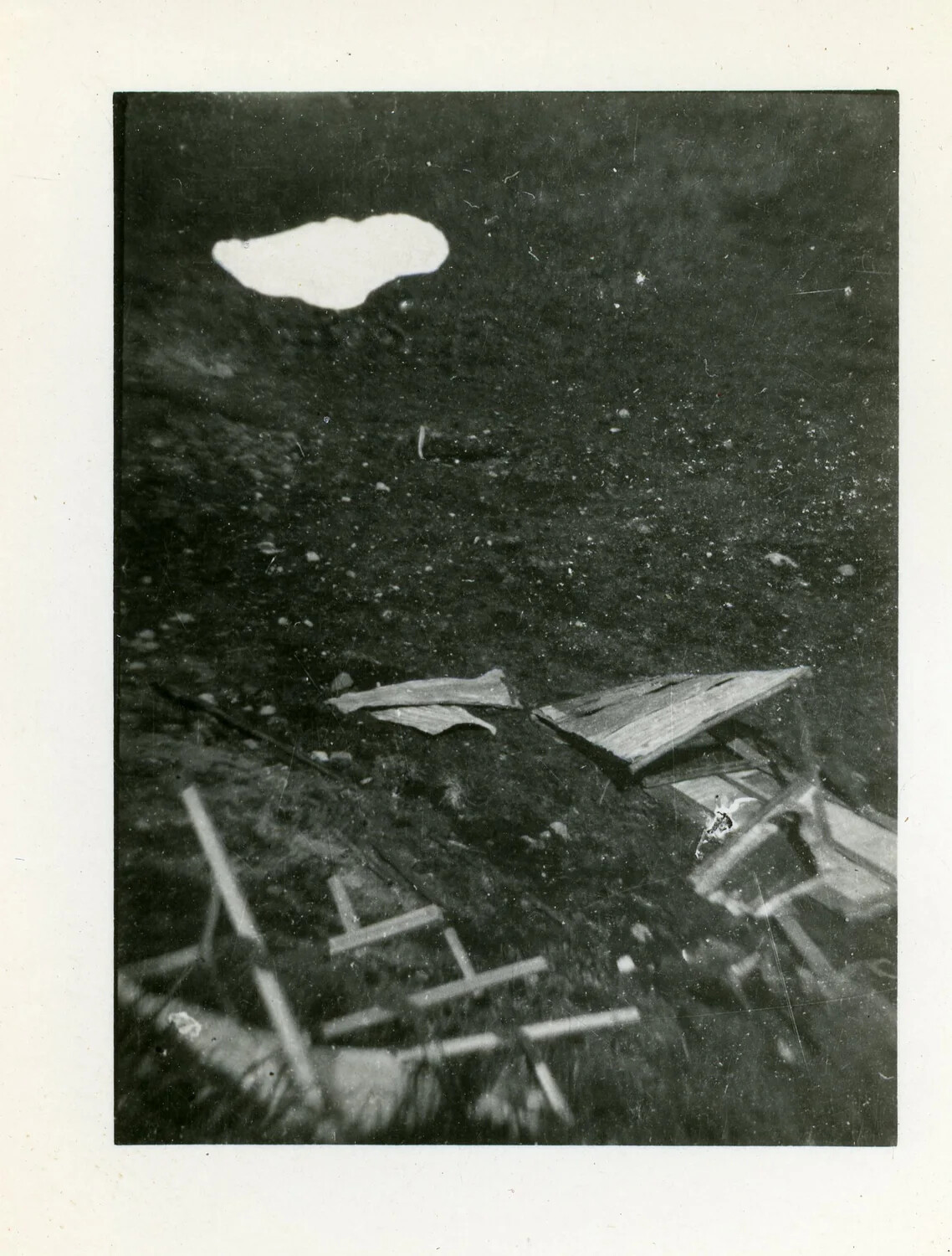 Wreckage/Debris on Dark Terrain, Joe Vieira WWII Photo Collection