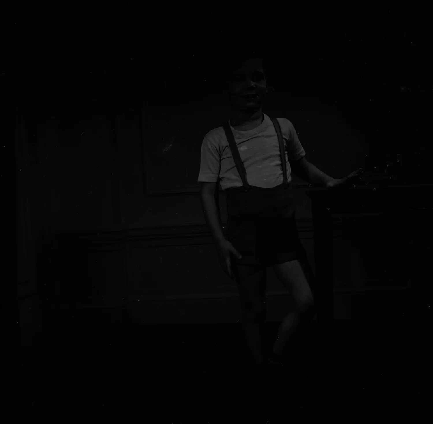 Underexposed Negative Frame: Boy in Suspenders, Interior Domestic Setting