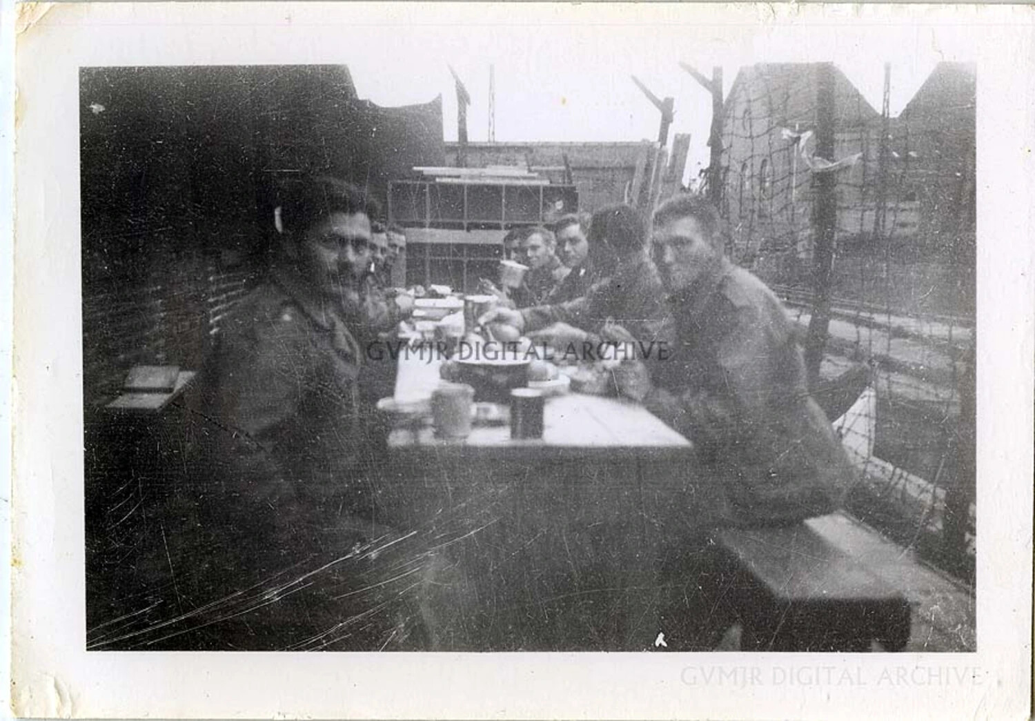 101st Airborne Division Soldiers Sharing an Outdoor Meal at a Camp Mess Table