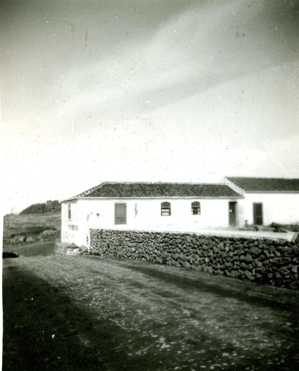 Whitewashed Rural Farmhouse with Stone Wall, Mediterranean/European Countryside, 1946