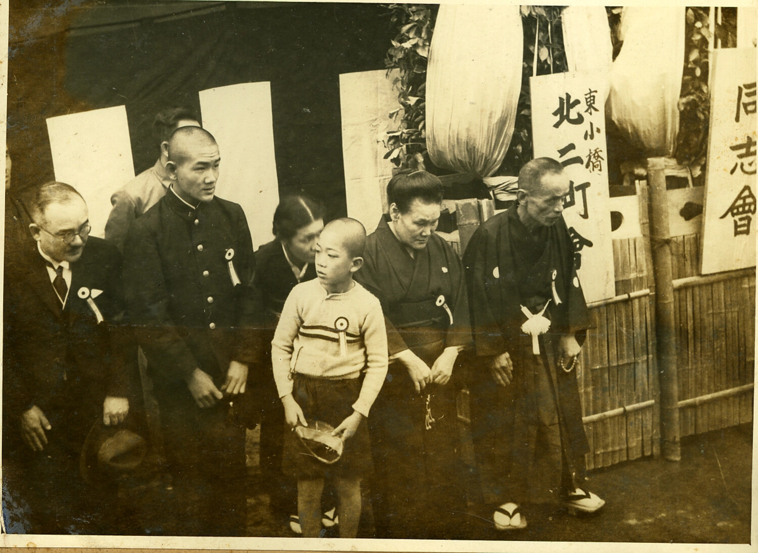 Group Portrait at a Japanese Neighborhood Association Ceremony with Lanterns and Banners, c. 1930s-1940s