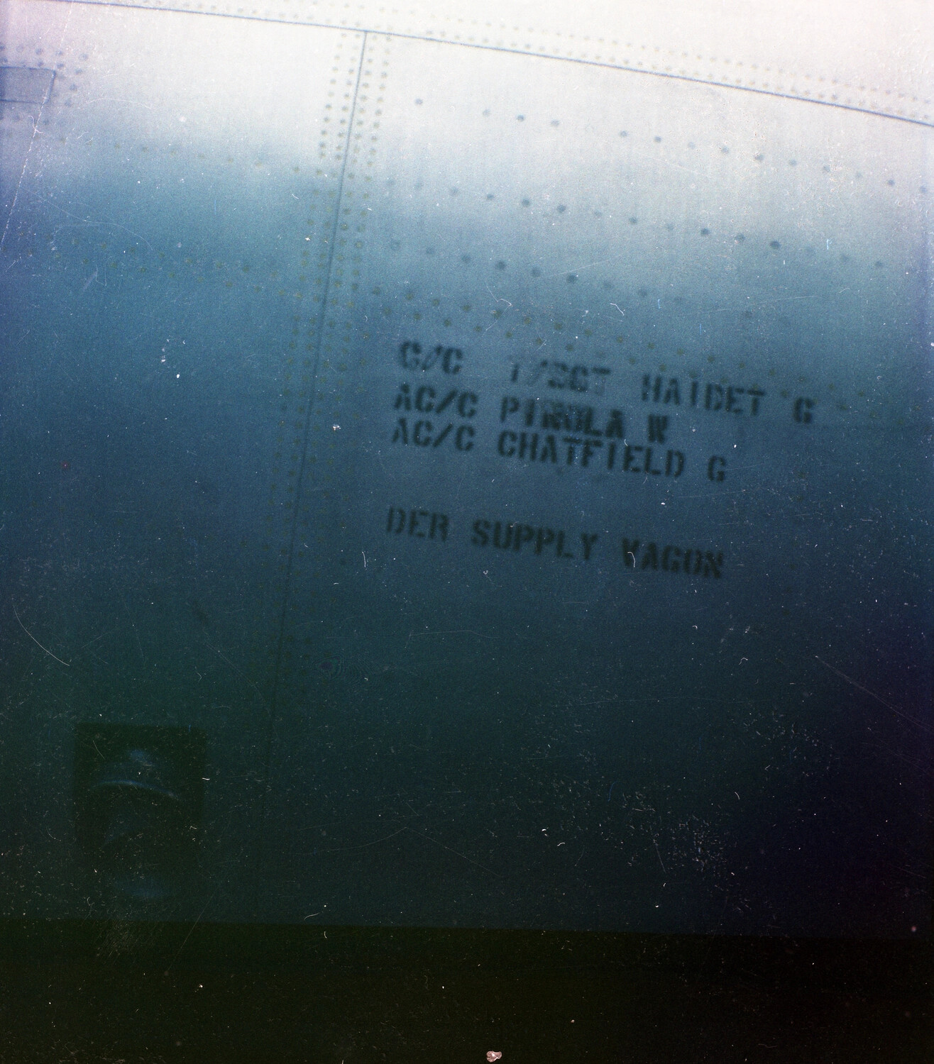 Stenciled Ground Crew Names on Boeing C-97 Fuselage
