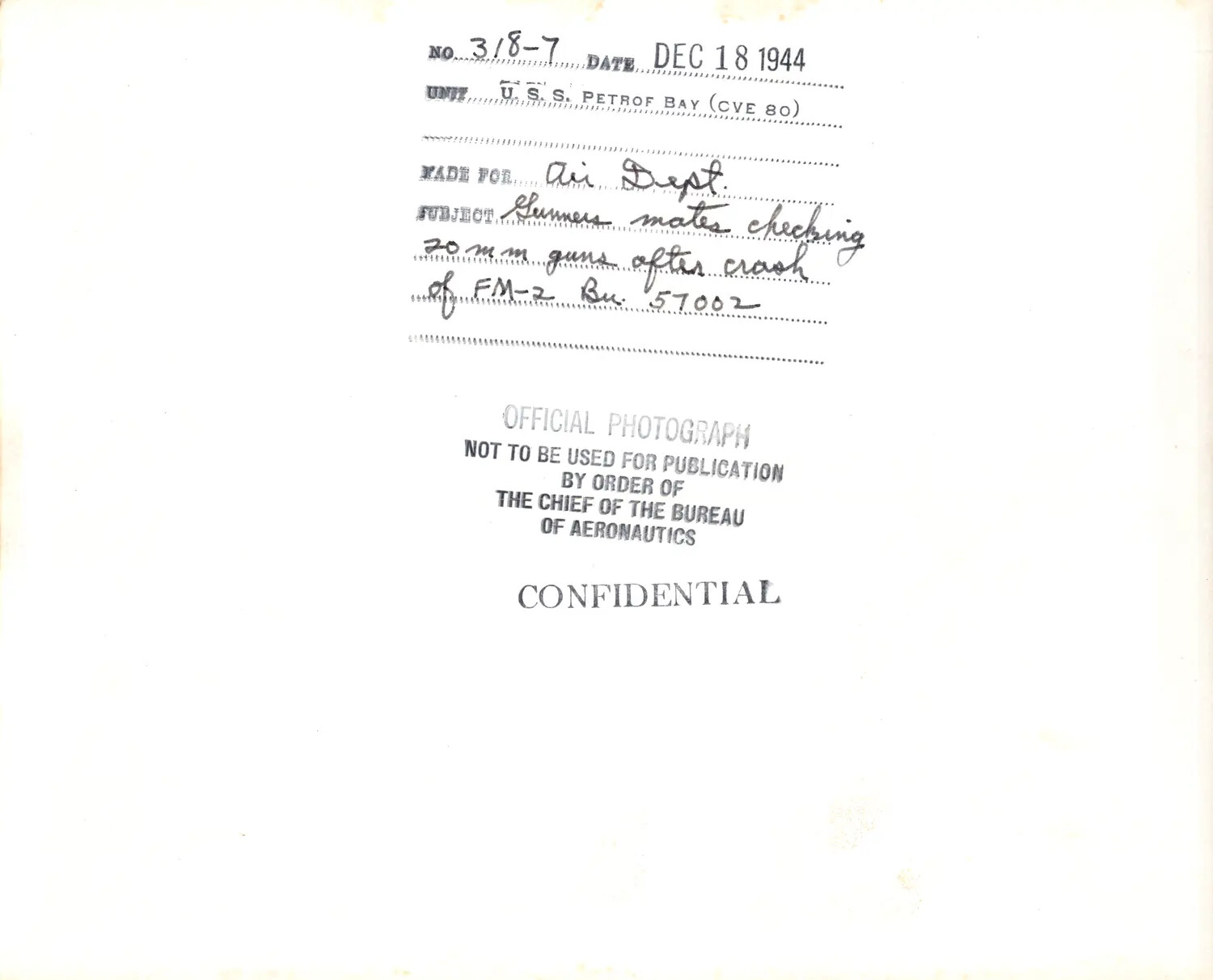 Caption Card, Verso of Official Navy Photograph No. 318-7, USS Petrof Bay (CVE-80)