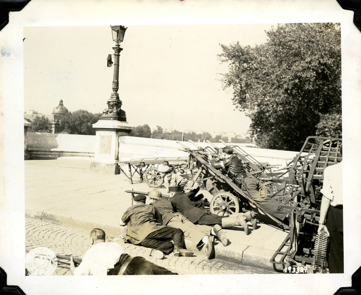 Armed Fighters Behind Improvised Cart Barricade, Liberation of Paris, August 1944