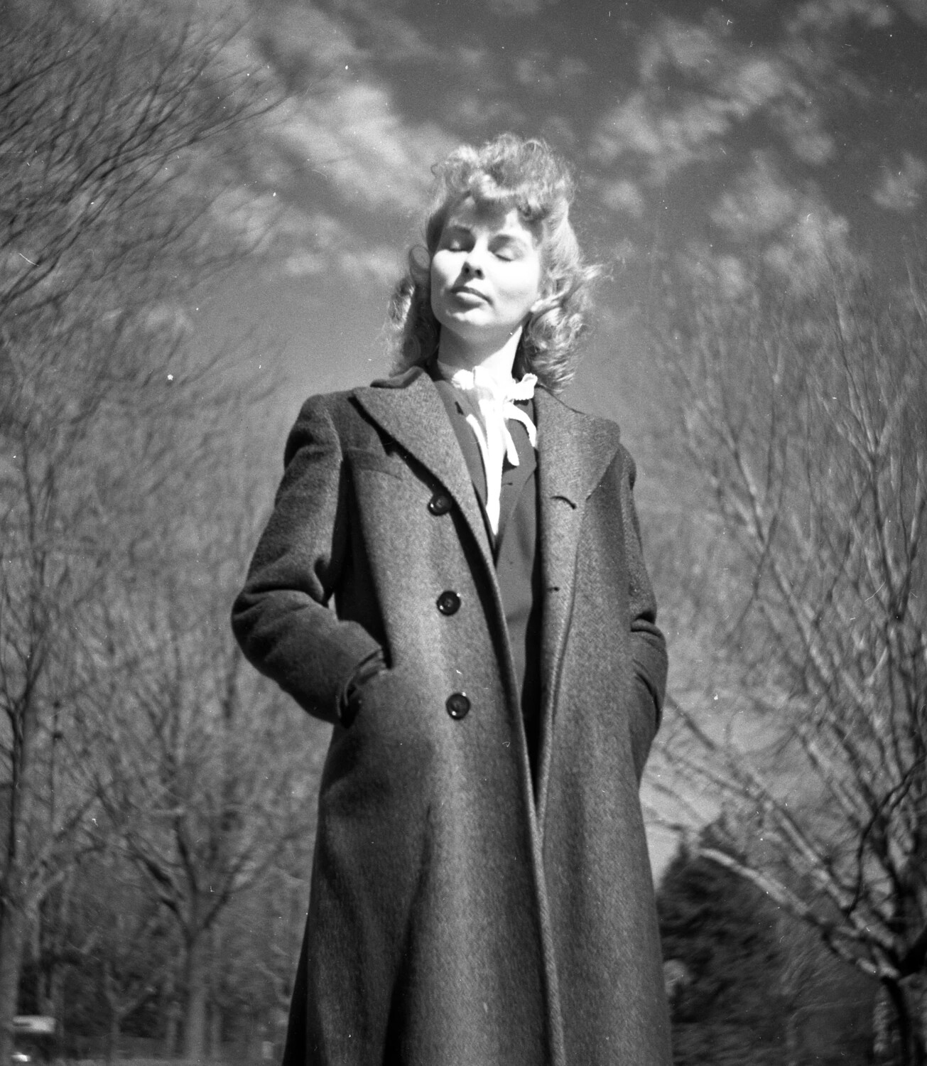 Young Woman with Eyes Closed in Sunlight - Outdoor Portrait Series
