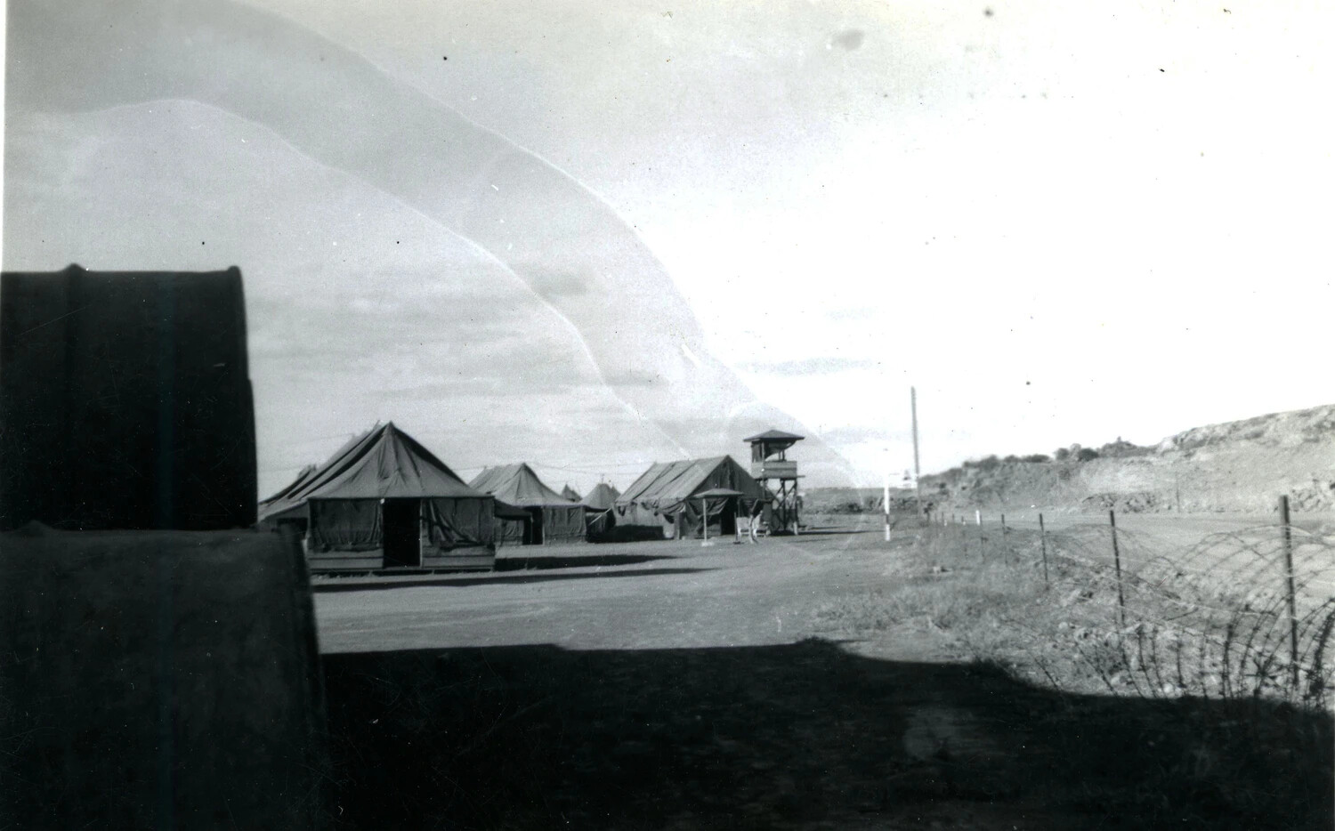 5th Marine Division Tent Encampment with Watchtower and Perimeter Fence