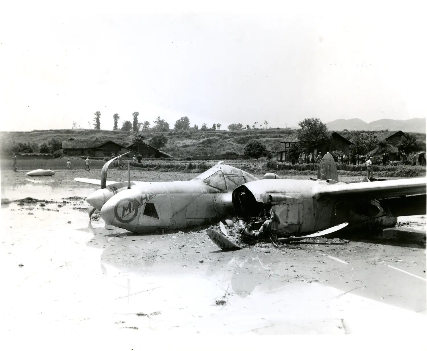 Crash-Landed Twin-Engine Aircraft in Rice Paddy, China-Burma-India Theater