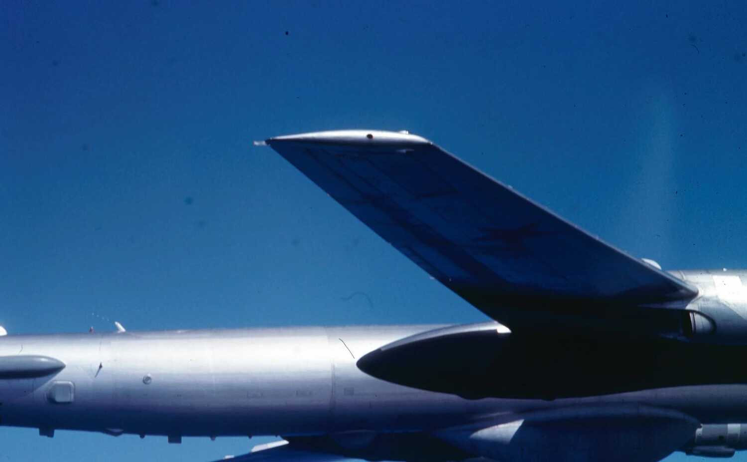 Close-Up of Soviet Tu-16 'Badger' Tail Fin and Engine Nacelle, Cold War Intercept