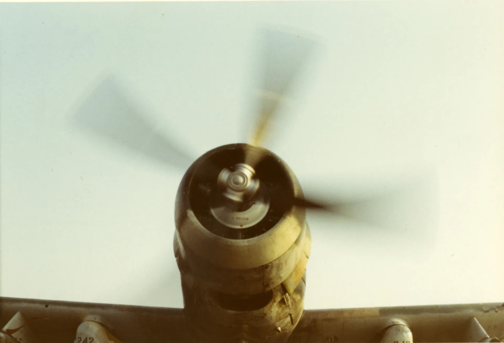 A-1 Skyraider Engine and Propeller Close-Up with Wing Ordnance, Color Photograph