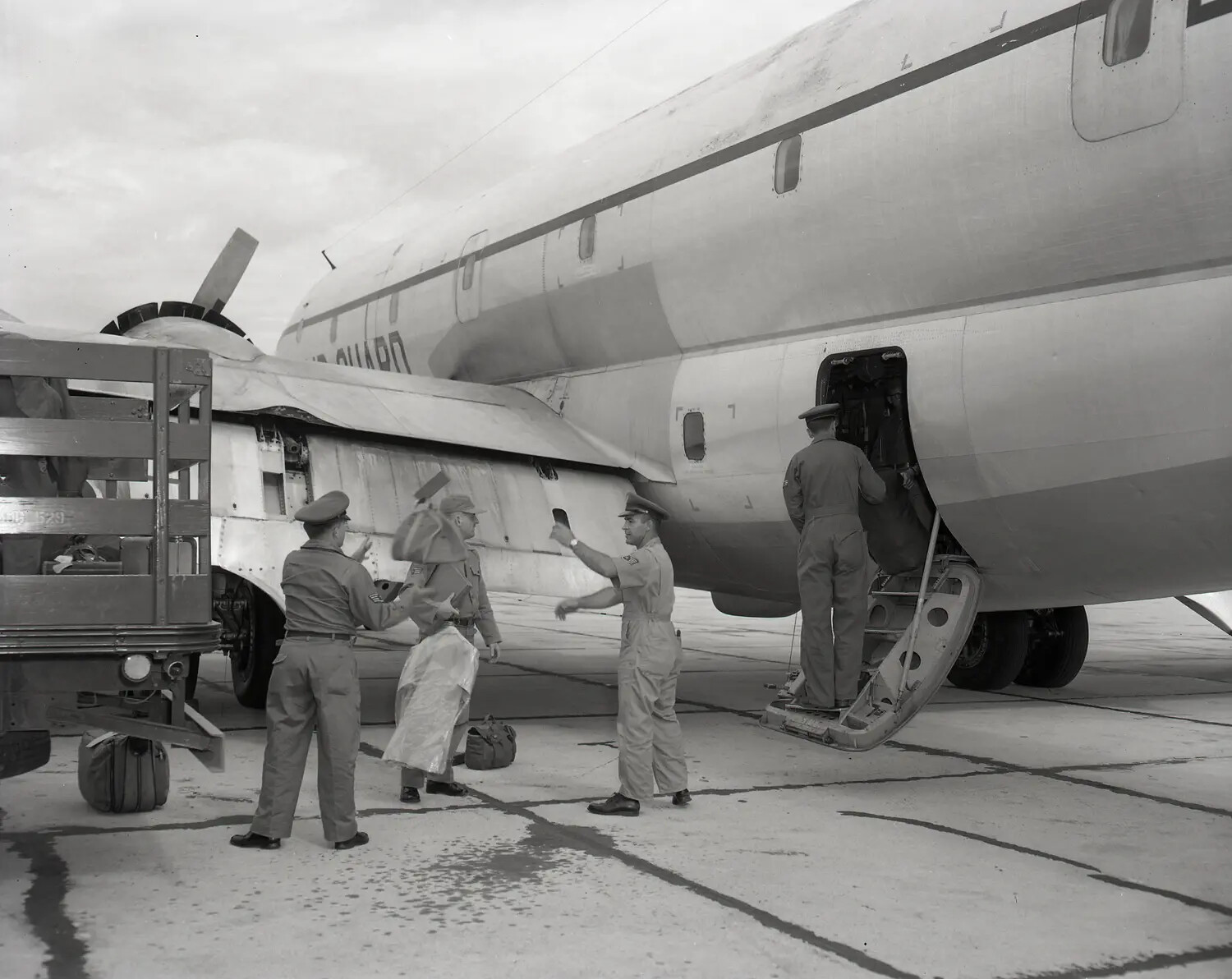 Airmen Boarding California Air National Guard C-97/KC-97 Stratofreighter via Rear Airstair