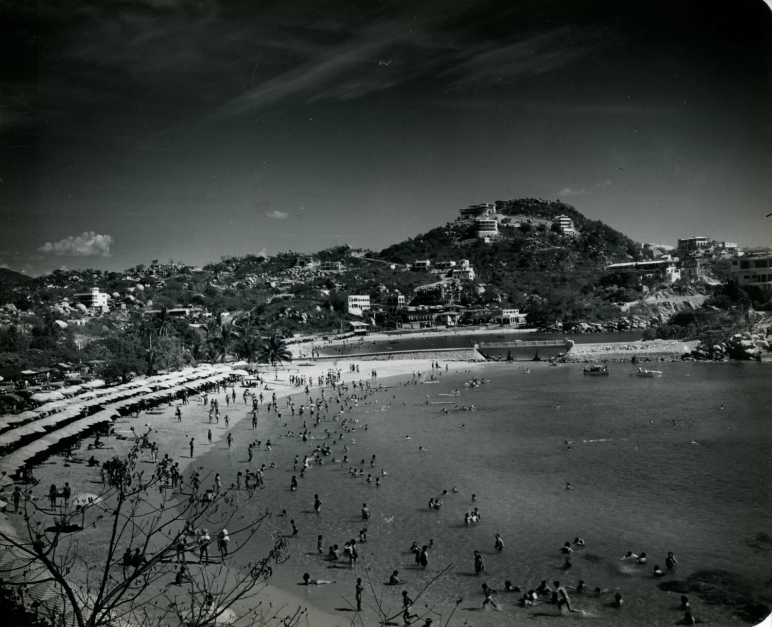 Crowded Beach and Hillside Development, Acapulco Bay, 1949