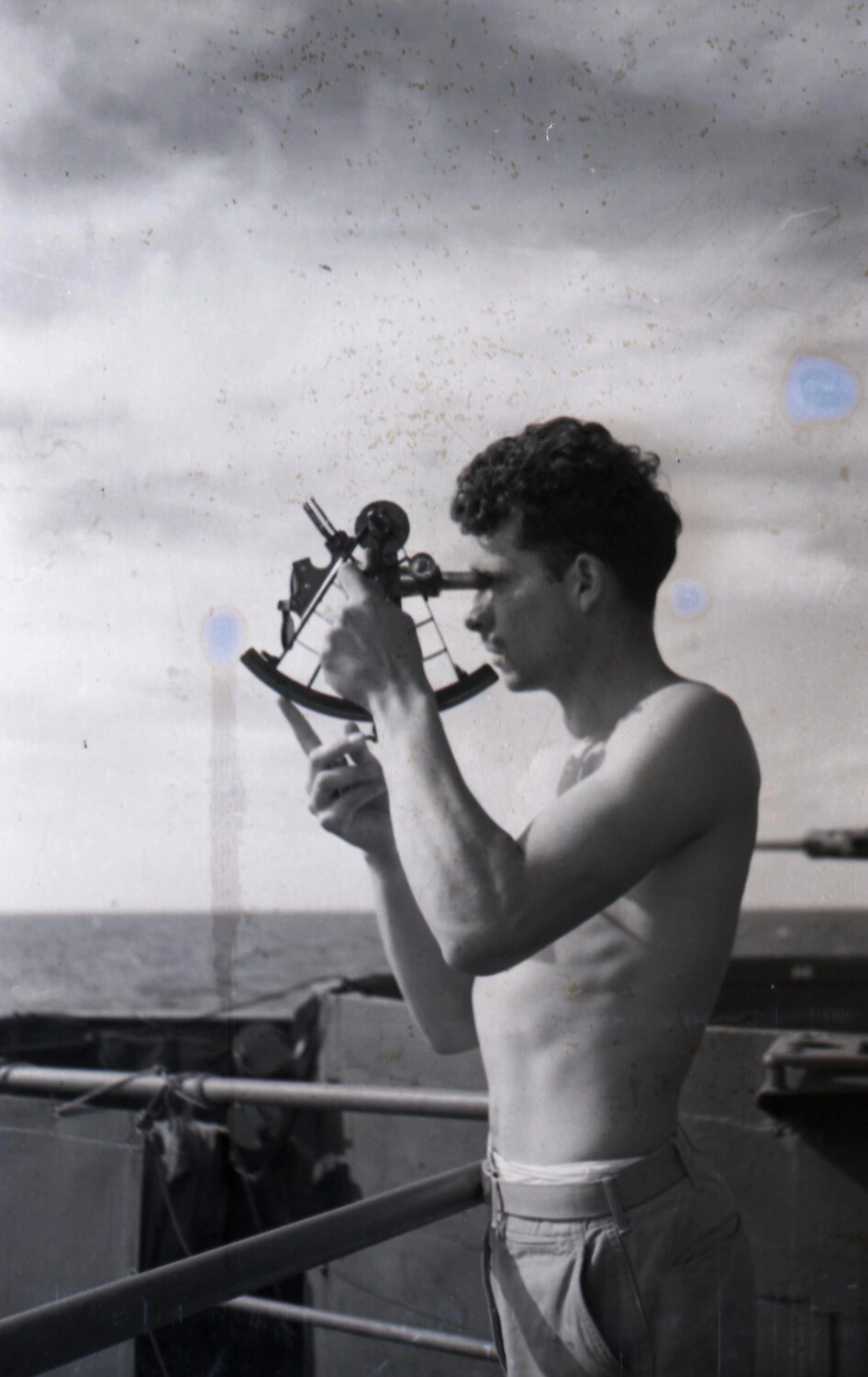Sailor Taking a Sextant Reading Aboard Ship, WWII CBI-Era Voyage
