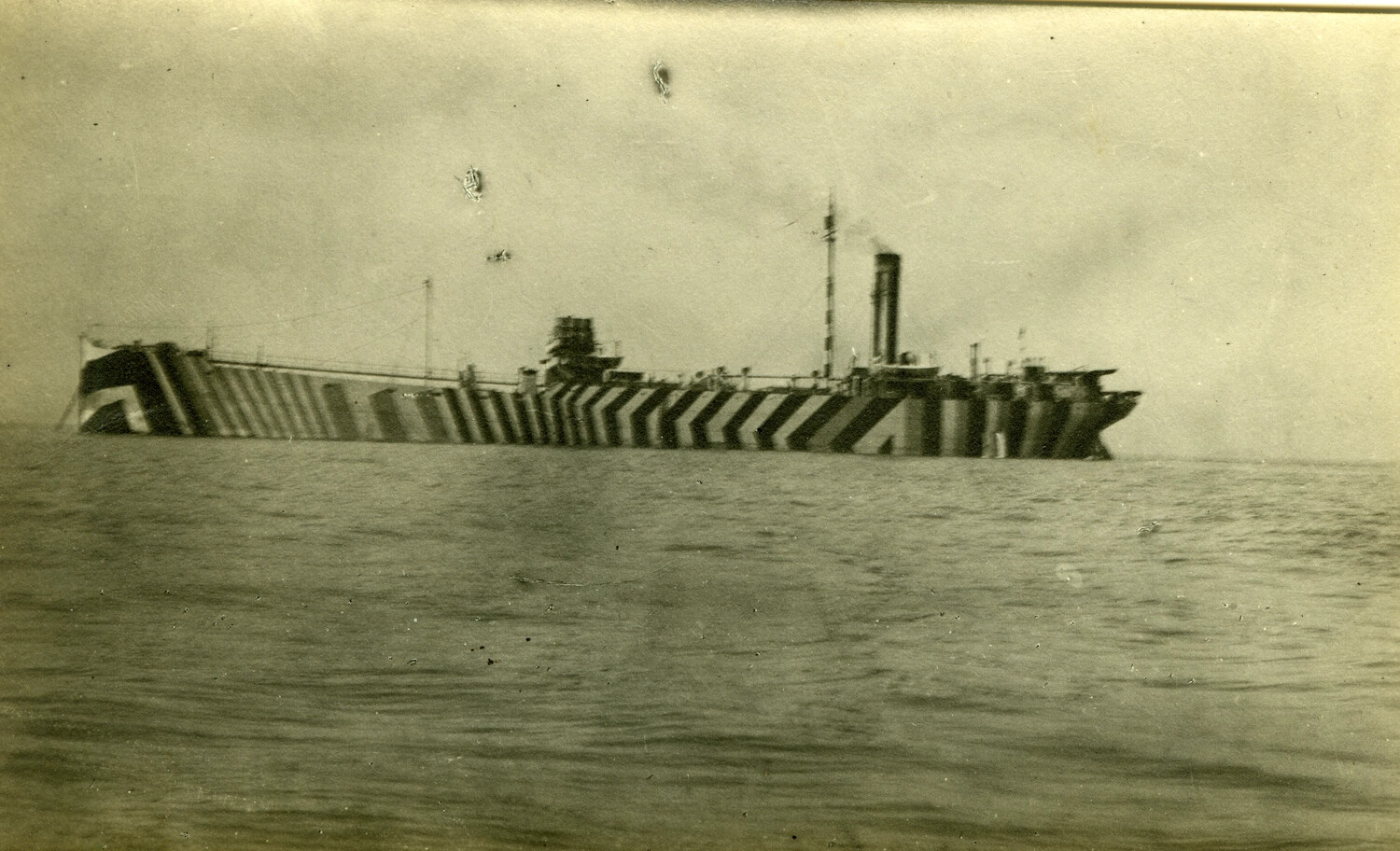Dazzle-Camouflaged Steamship at Sea, Carl Stone Photograph Collection