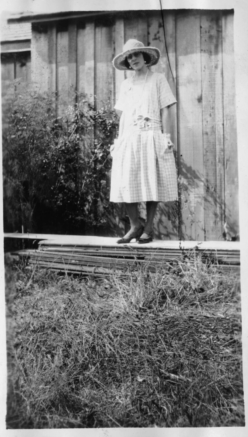 Young Woman in Checked Drop-Waist Dress and Straw Hat, c. mid-to-late 1920s