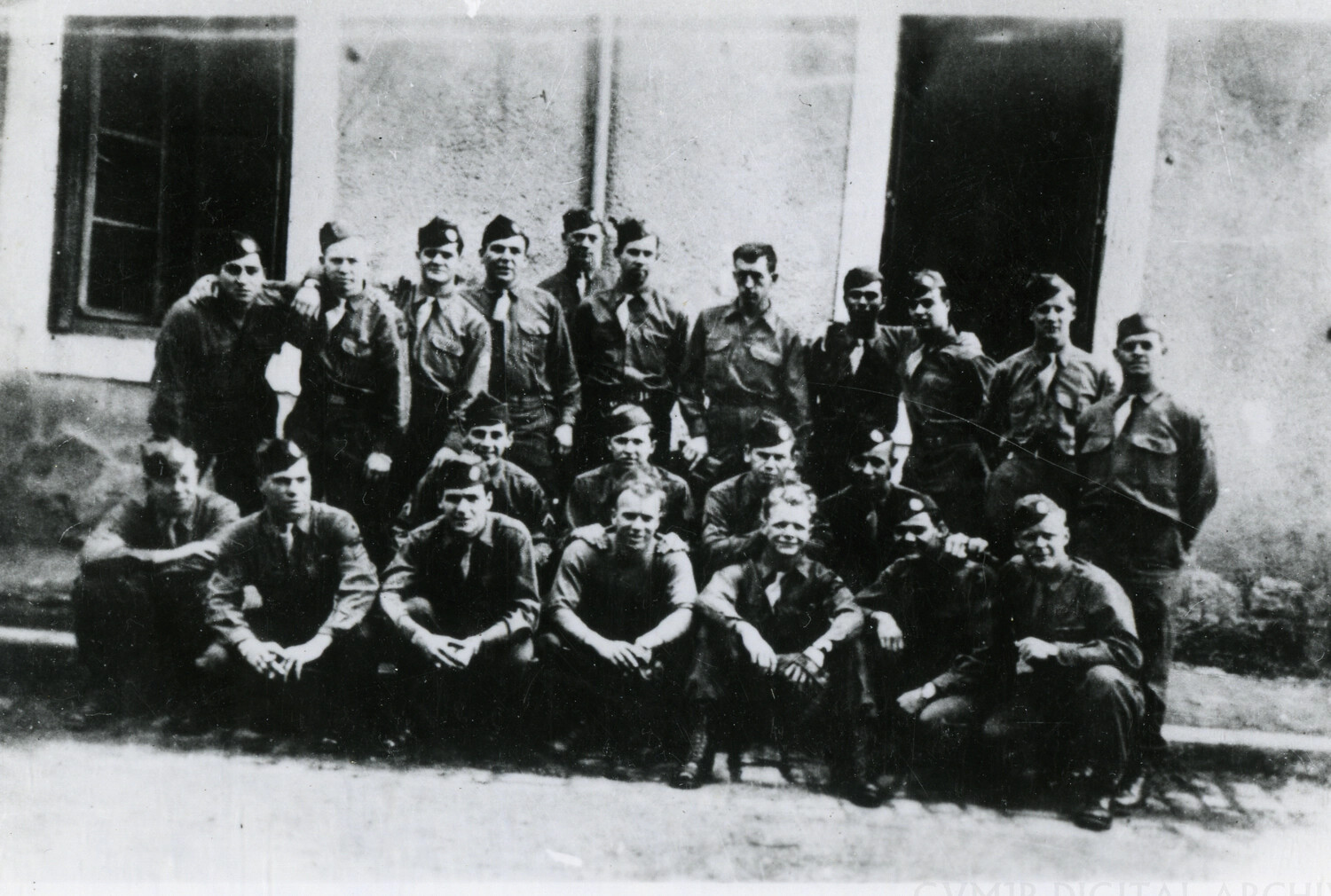 Group Portrait of American Soldiers Outside European Billet, WWII