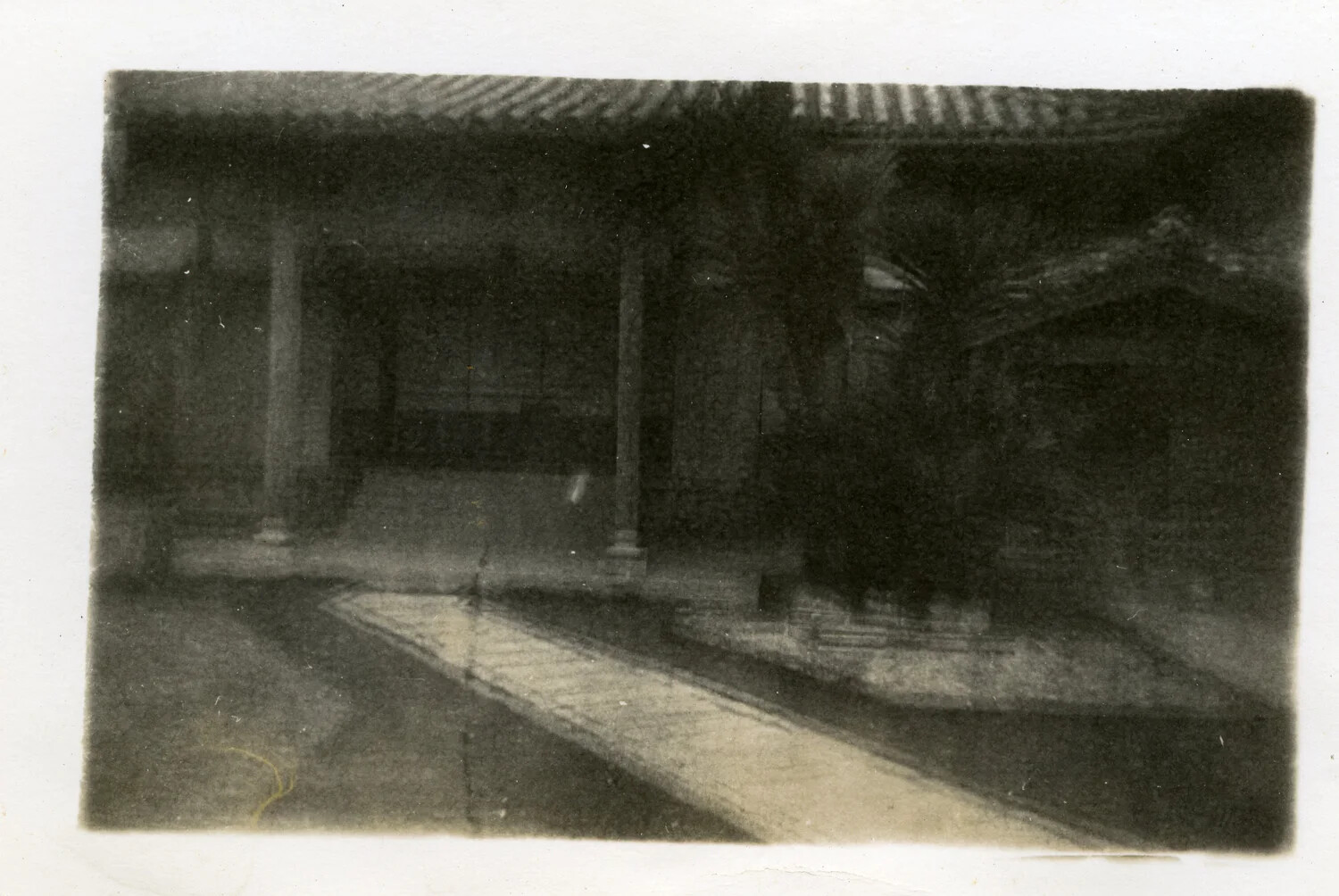 Underexposed Snapshot of a Traditional Japanese Building Courtyard, U.S. Occupation Era (c. 1945–1952)