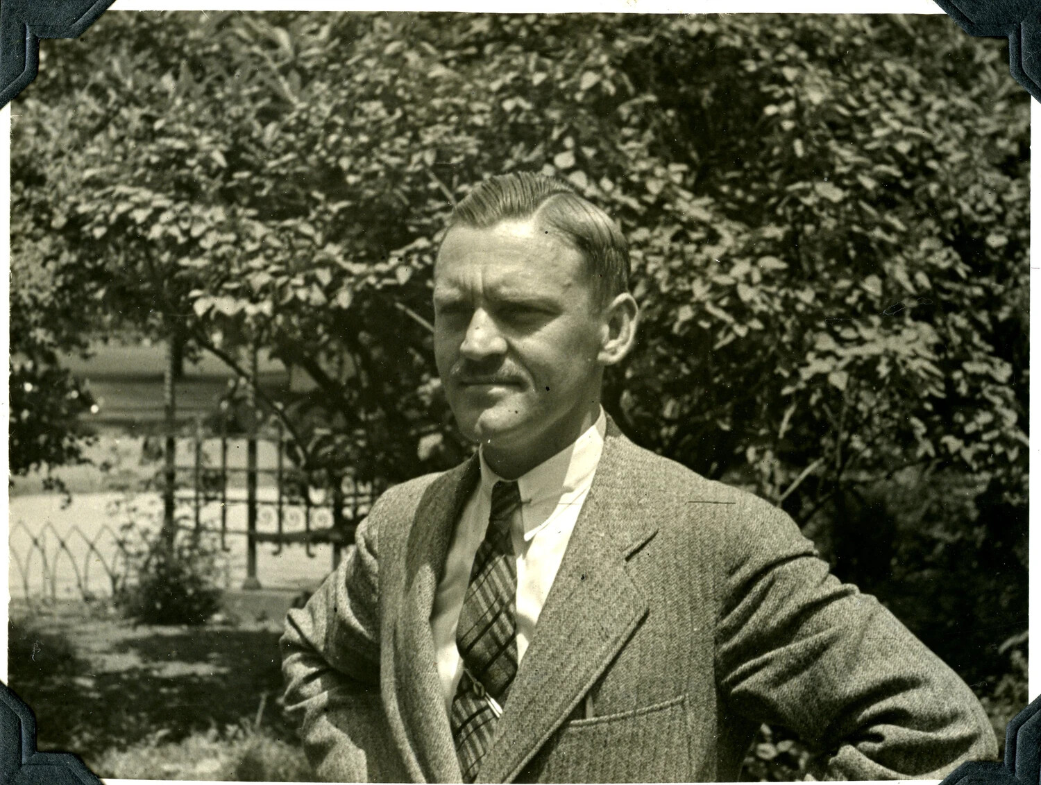 Portrait of a Man in Tweed Suit and Plaid Tie, Garden Setting, Early 20th Century
