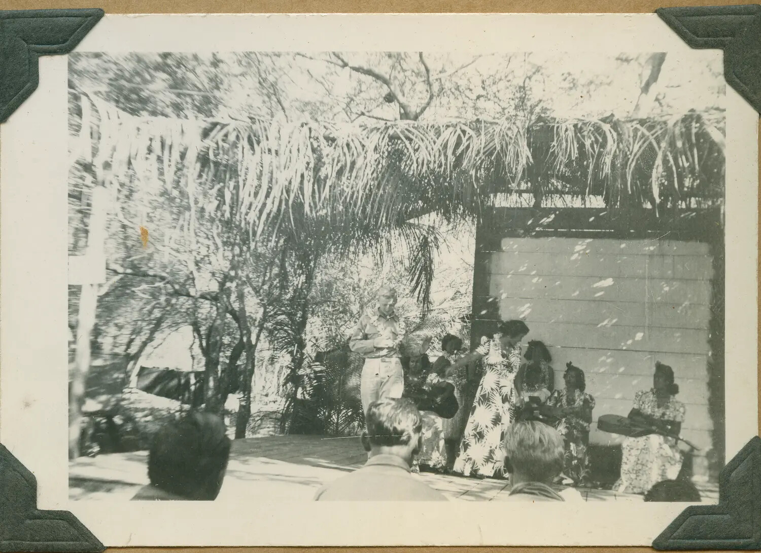 Serviceman Presented with Lei During USO Show, Ewa Plains, Oahu, World War II Era