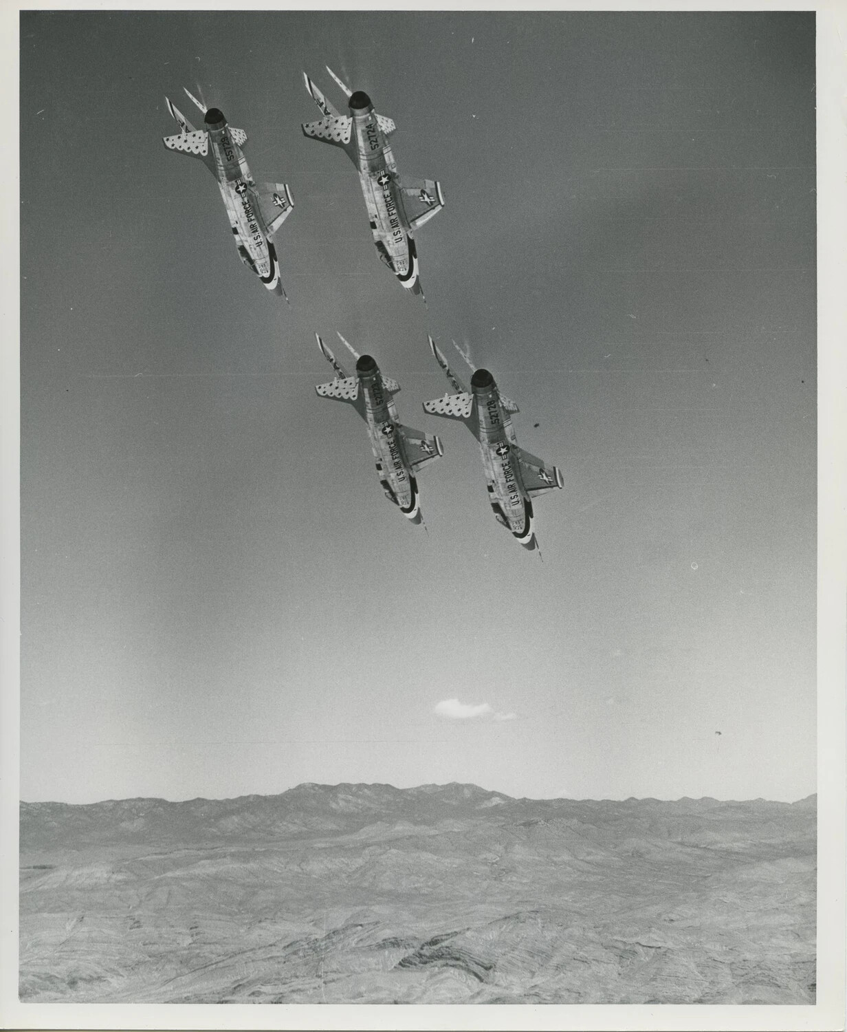 Thunderbirds F-100 Super Sabres in Diamond Formation with Visible Tail Numbers