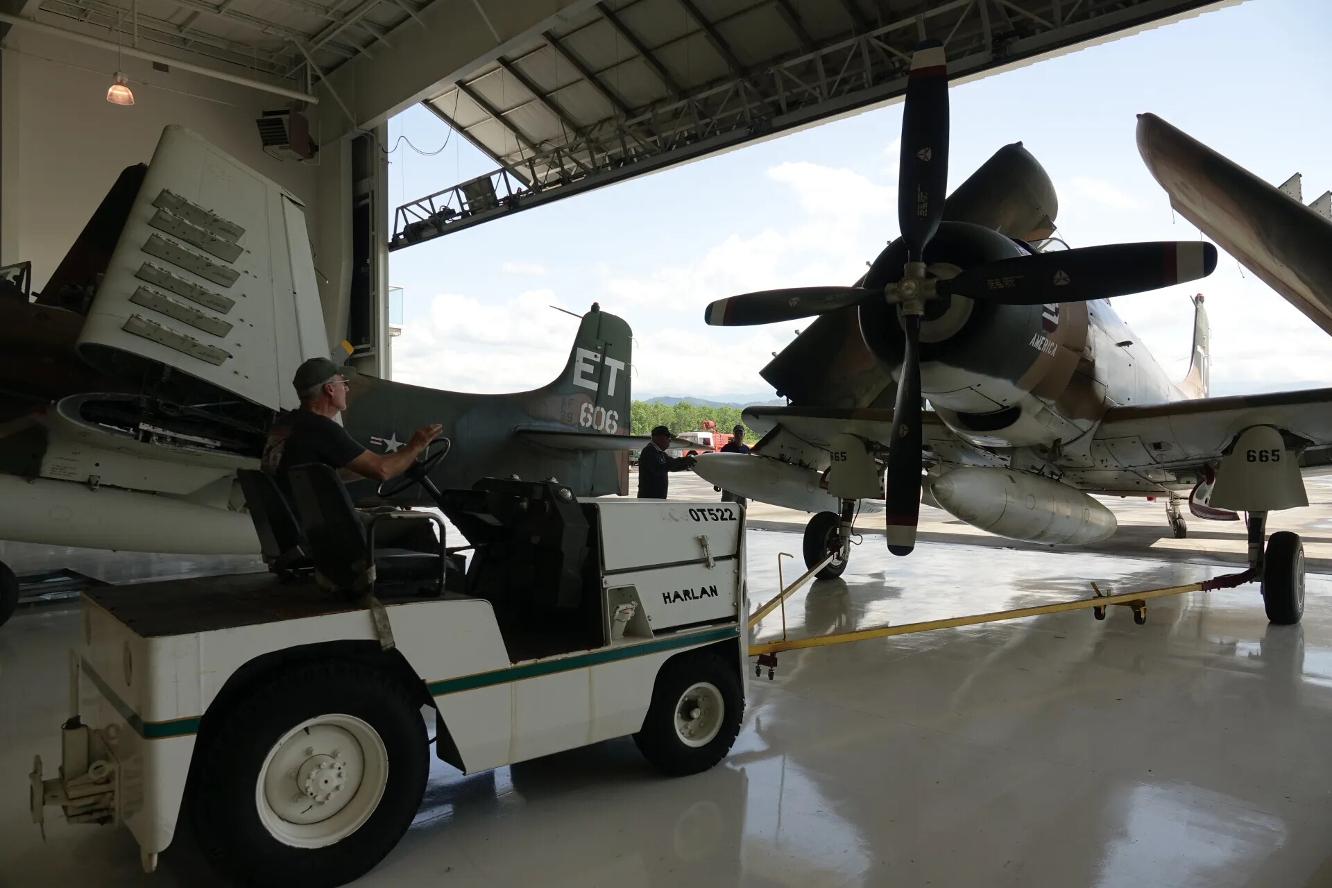 Museum A-1 Skyraiders Being Towed in Hangar, 'ET 606' and '665 America', May 2019 Event