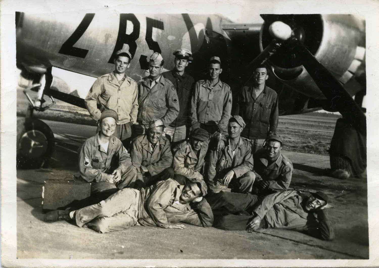 Group Portrait of Army Air Forces Ground Crew Before Bomber Aircraft 'LB5,' World War II