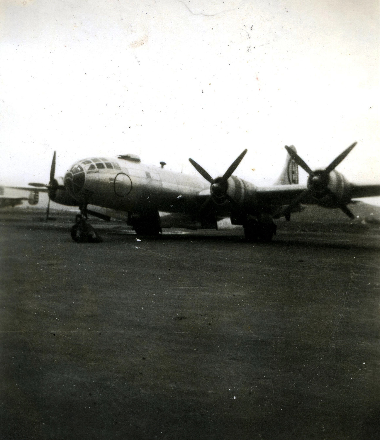 Boeing B-29 Superfortress Parked on Airfield Ramp