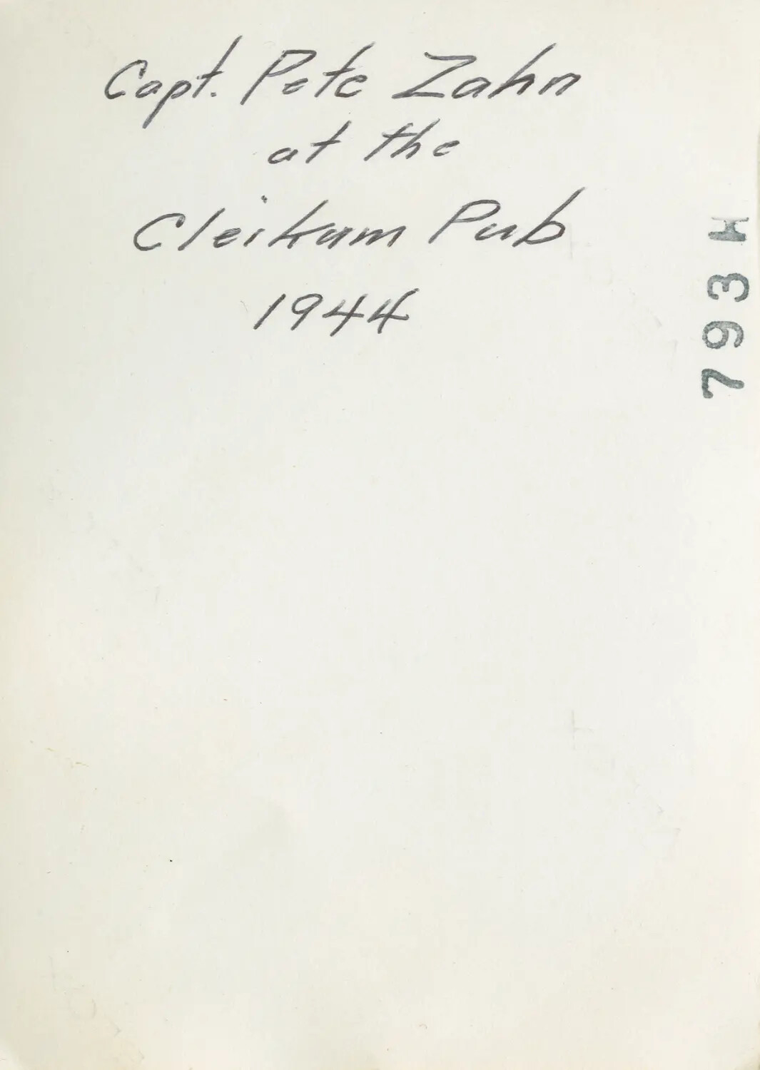 Reverse Side Annotation: 'Capt. Pete Zahn at the Cleikum Pub, 1944'