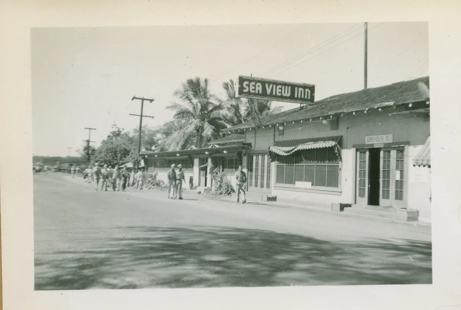 Soldiers Passing the Sea View Inn, Hawaii, WWII Era