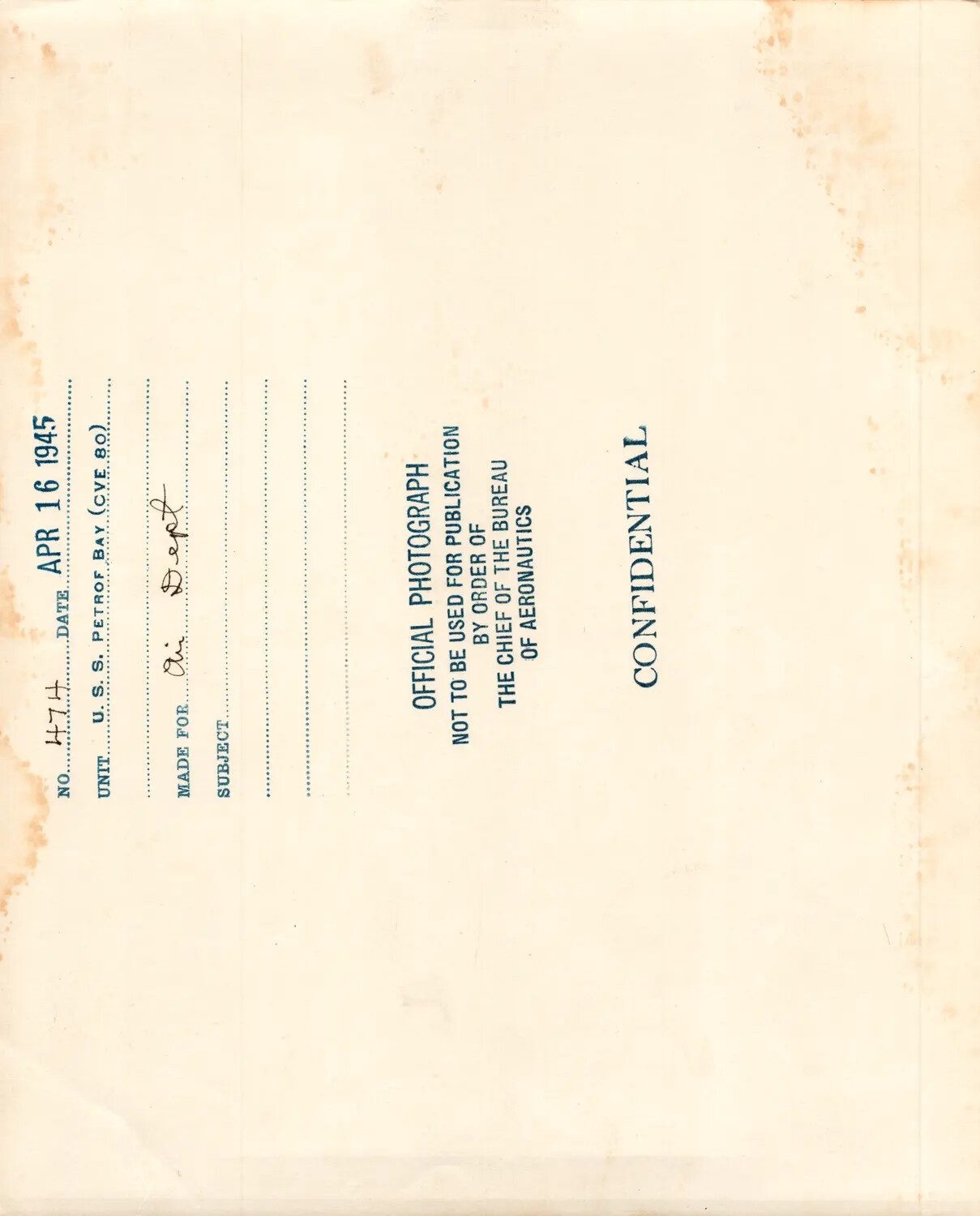 Verso Caption Card of Official U.S. Navy Photograph No. 474, U.S.S. Petrof Bay (CVE-80), April 16, 1945, Confidential