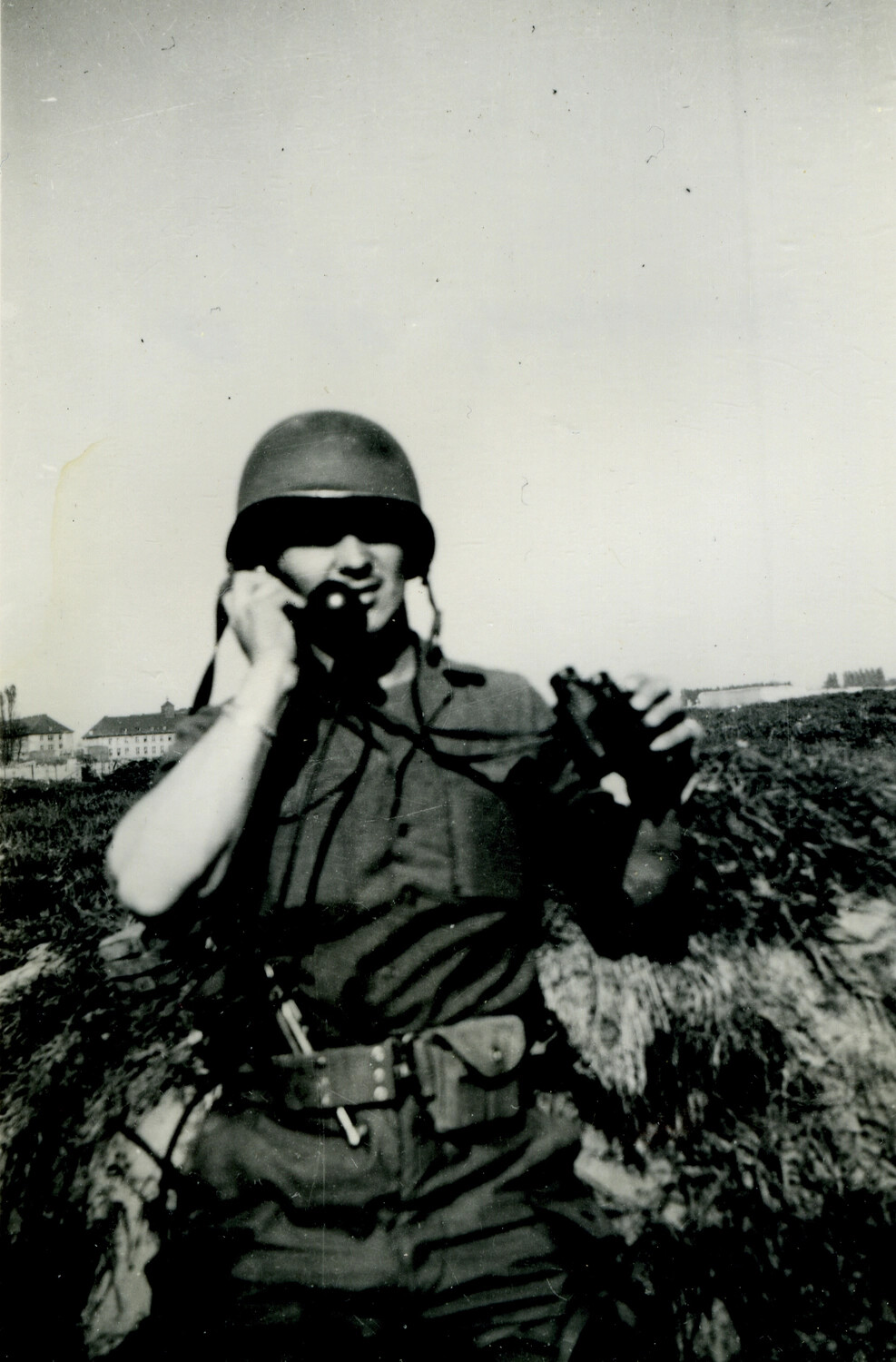 101st Airborne Paratrooper Photographing with Personal Camera in Field, WWII