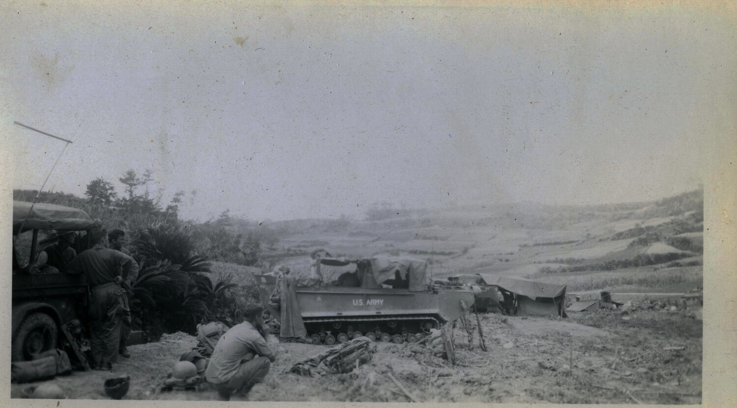 U.S. Army Tracked Vehicle and Jeep in Field Encampment, Likely Okinawa, 1945