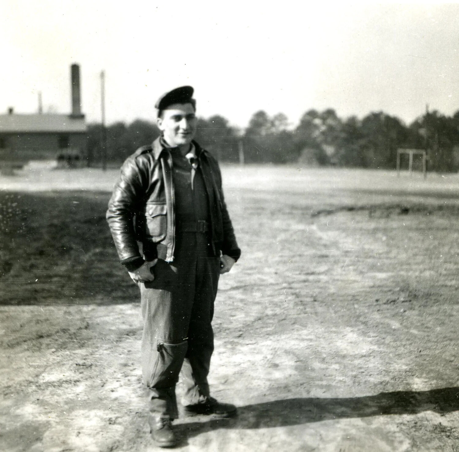 Airman in A-2 Flight Jacket and Coveralls at Training Base