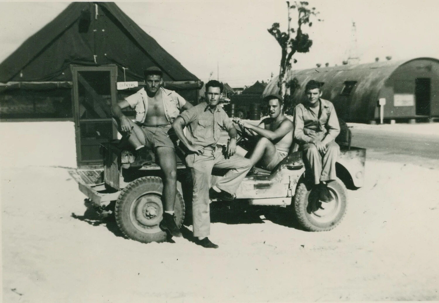 Four Servicemen on a Jeep, Pacific Theater Camp
