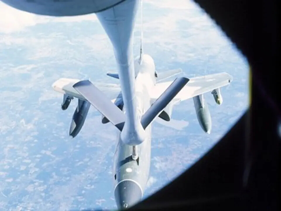 KC-135 Stratotanker Refueling an F-4 Phantom II in Flight