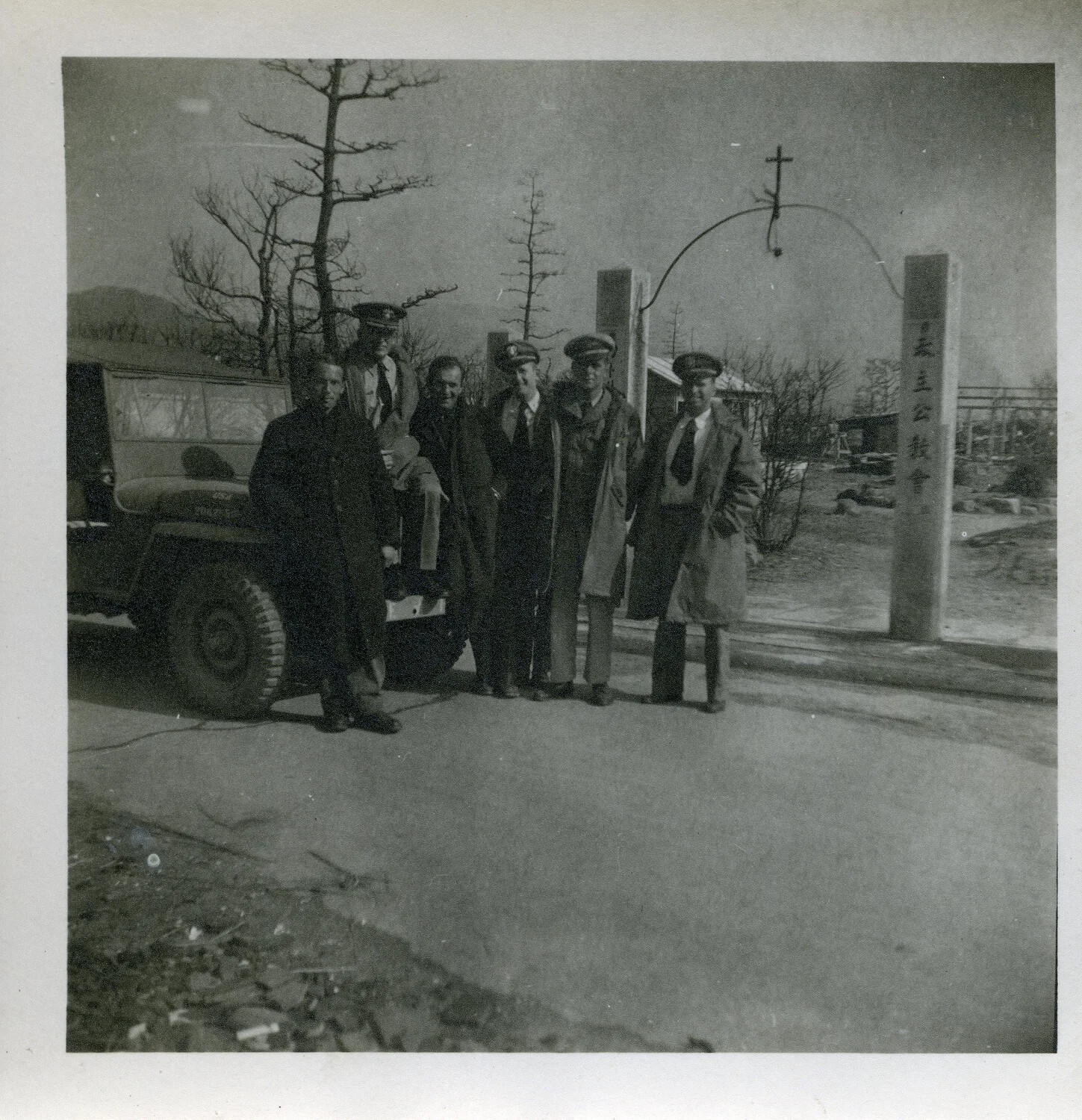 Group Portrait at Damaged Church Gate, Hiroshima, Postwar Occupation