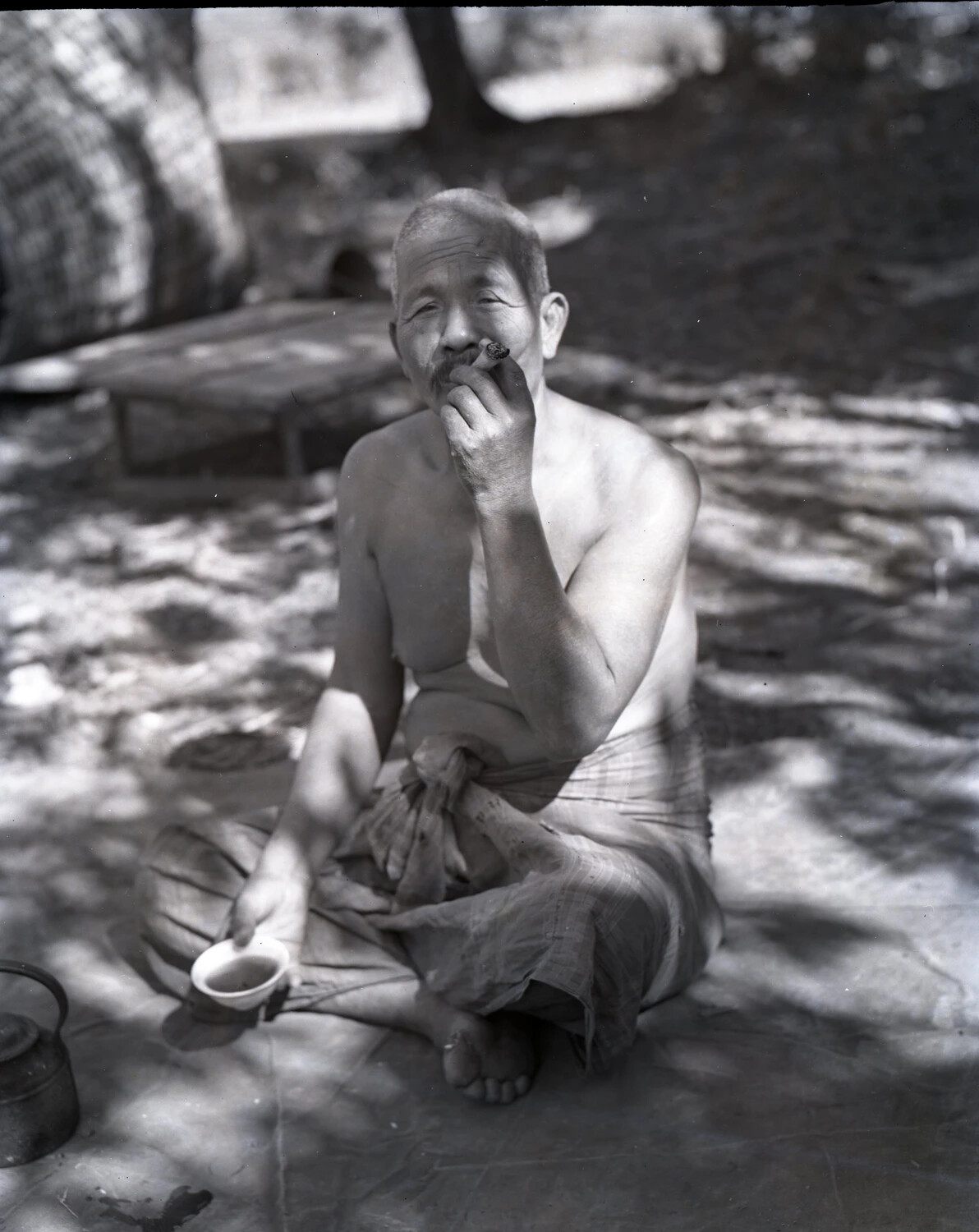 Portrait of an Elderly Local Man Smoking a Cheroot, CBI Theater, World War II
