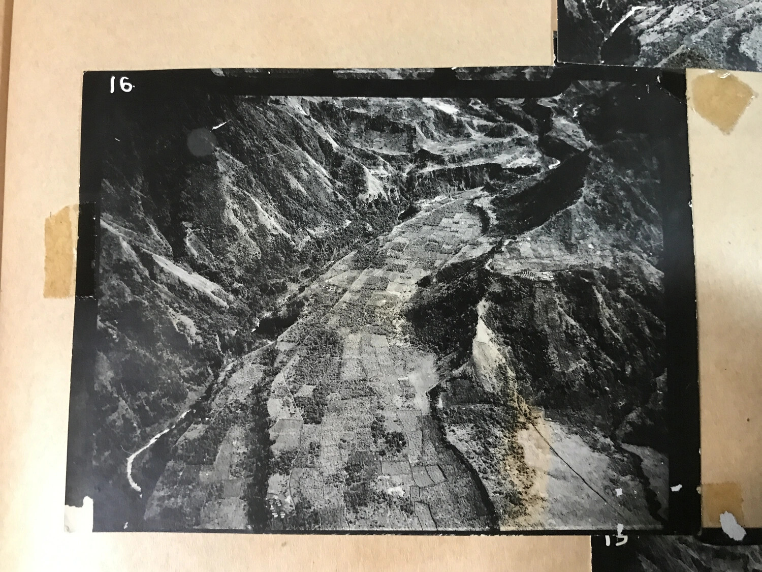 WWII-Era Aerial Reconnaissance Photograph of Mountainous River Valley Terrain, Frame 16
