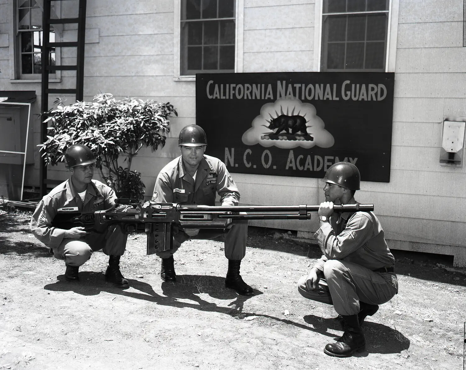 Three NCO Academy Students Handling Recoilless Rifle Barrel Assembly, Camp Roberts, June 1960