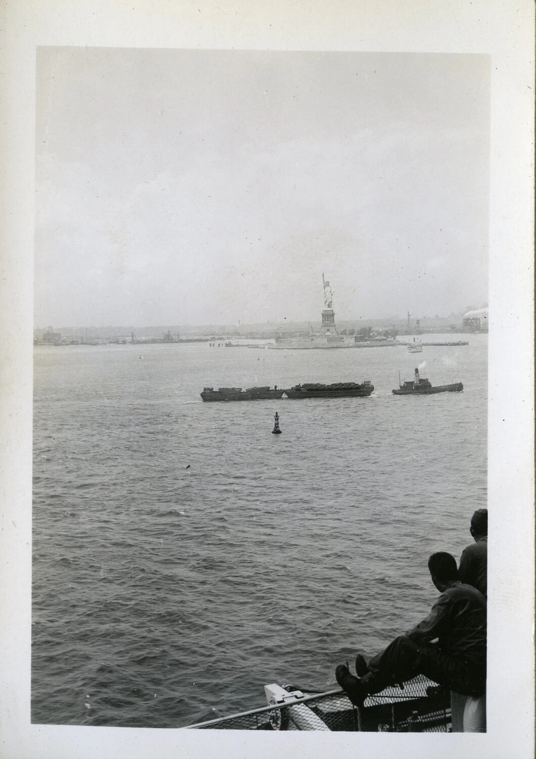 Soldiers Viewing the Statue of Liberty from Troopship, 44th Infantry Division, Norman Baget Album
