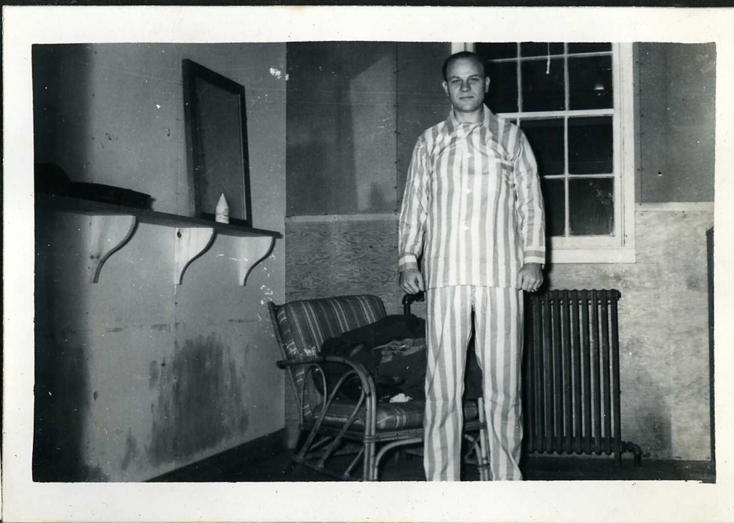 Man in Striped Pajamas in Furnished Room, Personal Snapshot