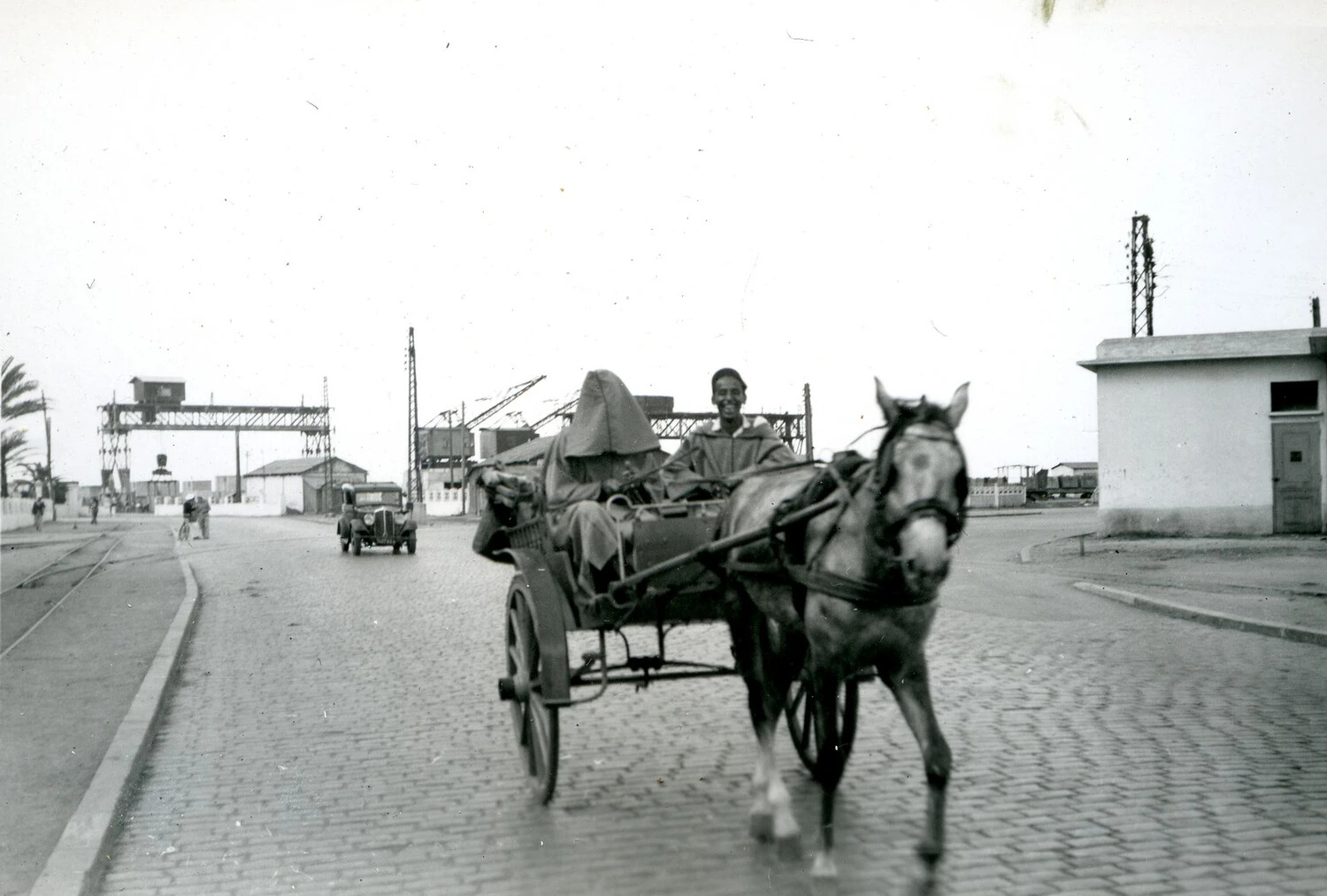 Horse-Drawn Cart on Cobblestone Street, North Africa or Middle East Transit Stop, World War II Era