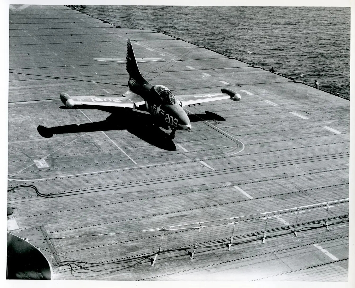 Grumman F9F Carrier Jet Fighter '209' Recovering Aboard Aircraft Carrier