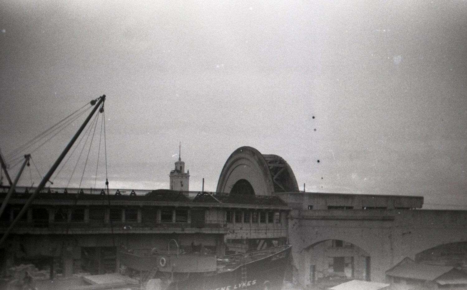 War-Damaged Manila Pier Terminal and Cargo Ship EUGENE LYKES, Philippines, 1945 (Alternate View)