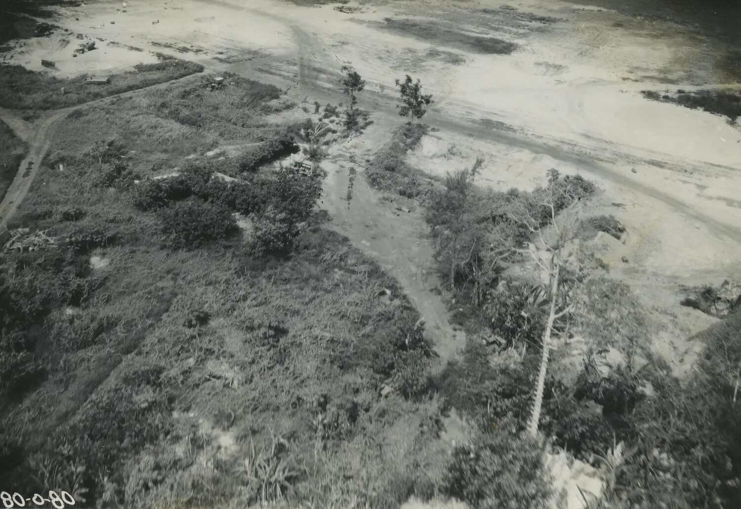 Aerial View of Cleared Airfield Terrain, New Guinea, World War II Era