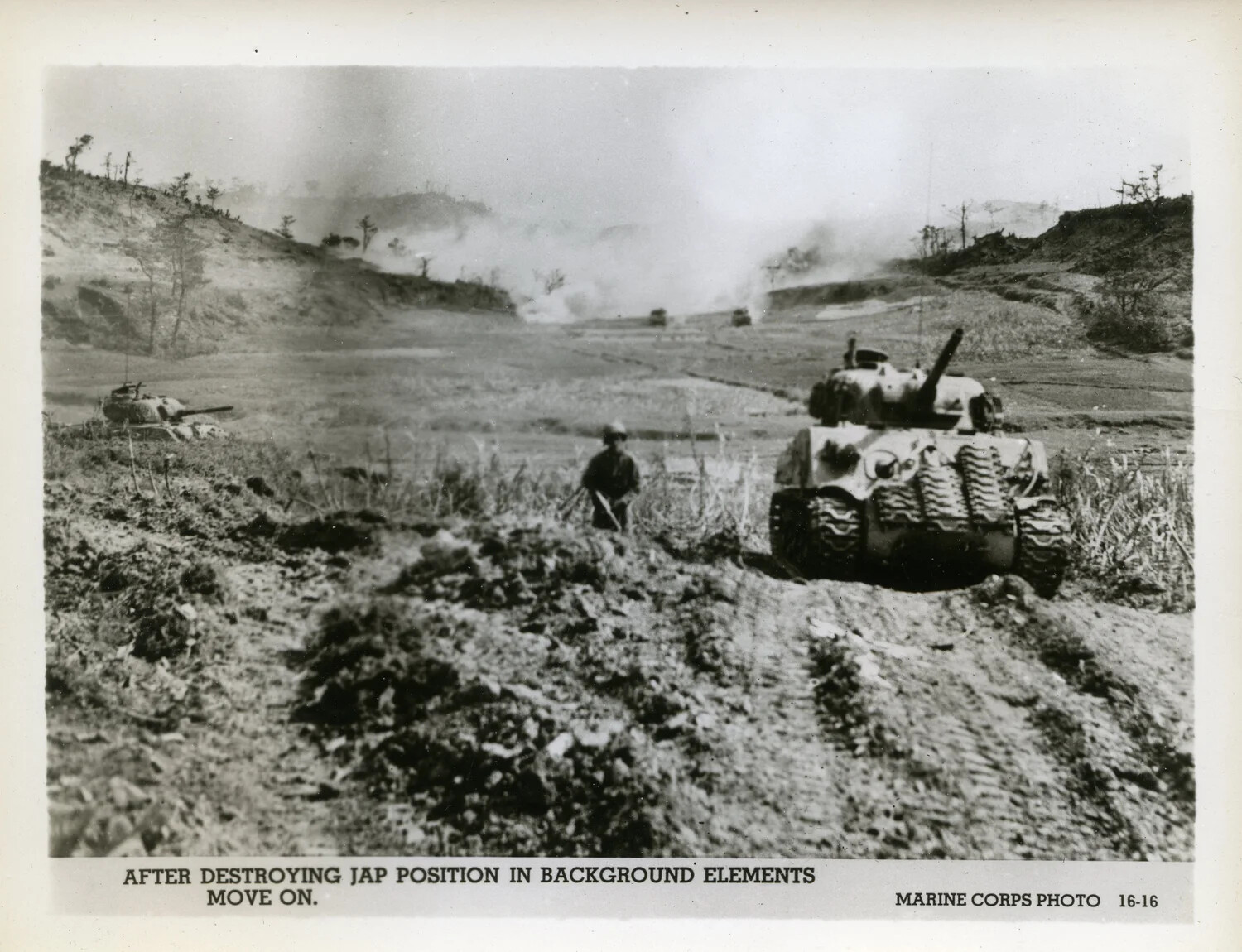 Marine Corps M4 Sherman Tanks Advance Across Okinawa Battlefield After Reducing Enemy Position