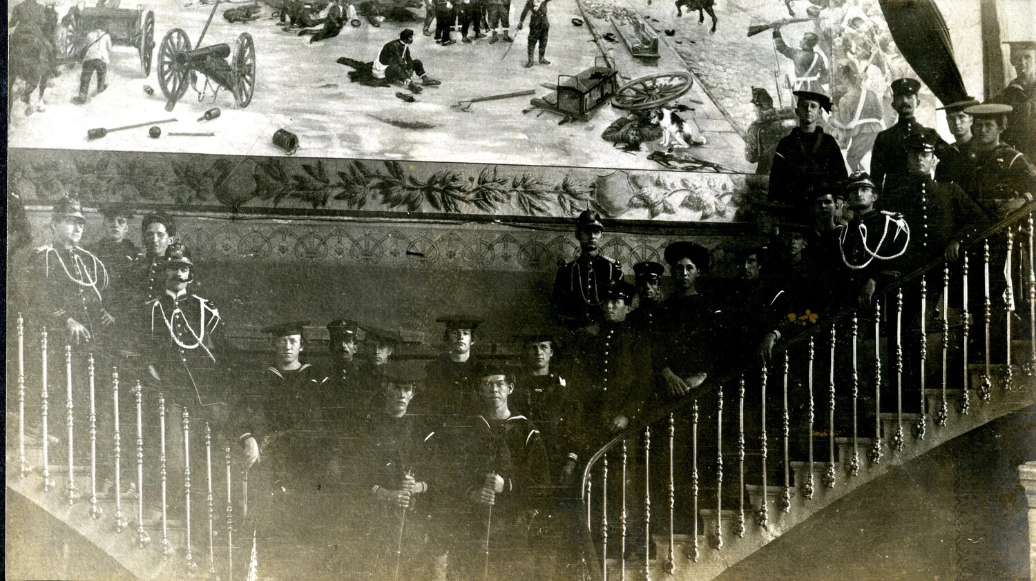 U.S. Navy Bluejackets and Local Honor Guard on Grand Staircase Beneath Battle Mural, Foreign Port Liberty Call, USS Columbia Album, c. 1898-1910